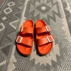 Orange birkenstocks